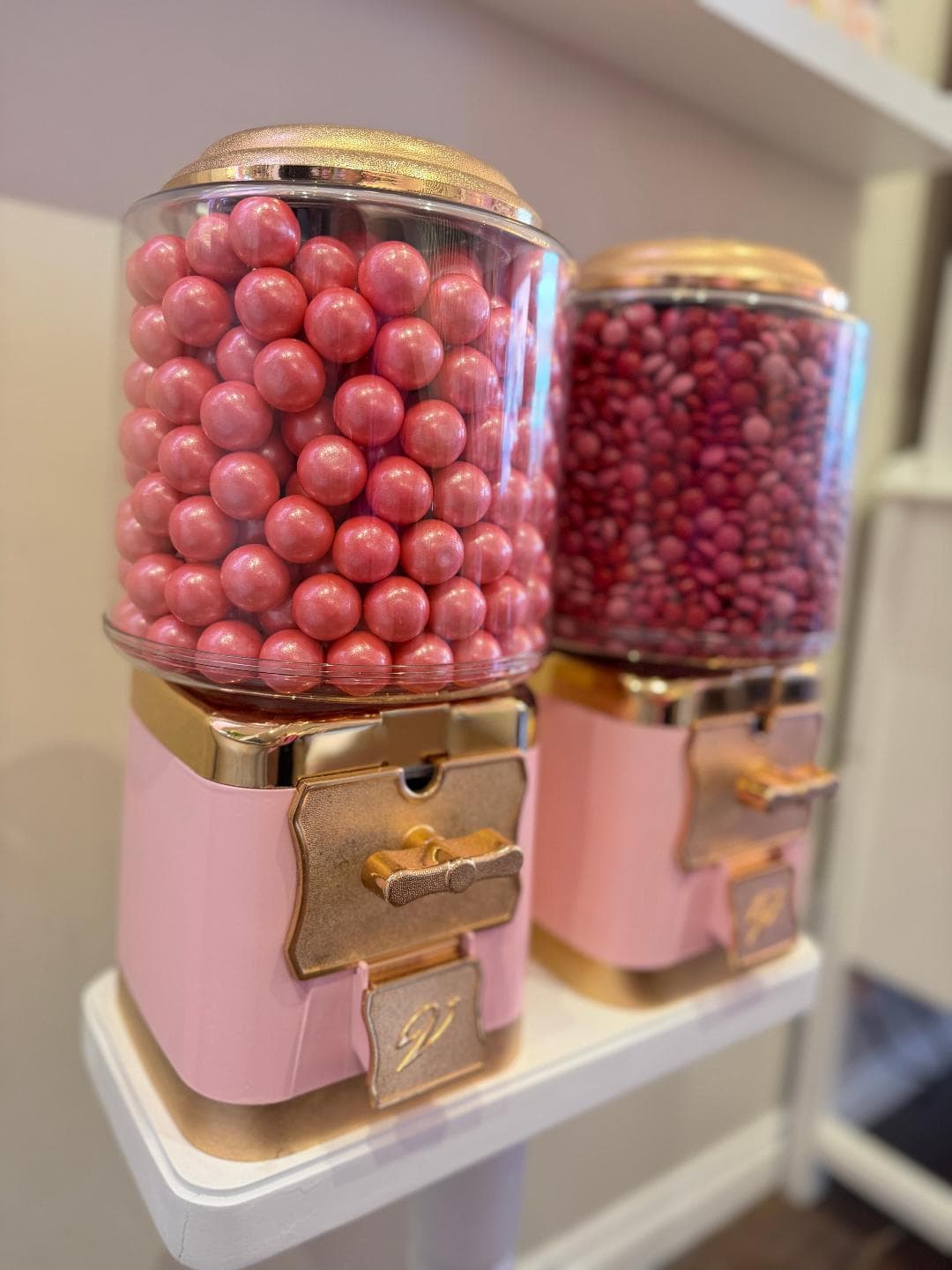 Pink candy dispensers inside the Farm & Flour bakery boutique