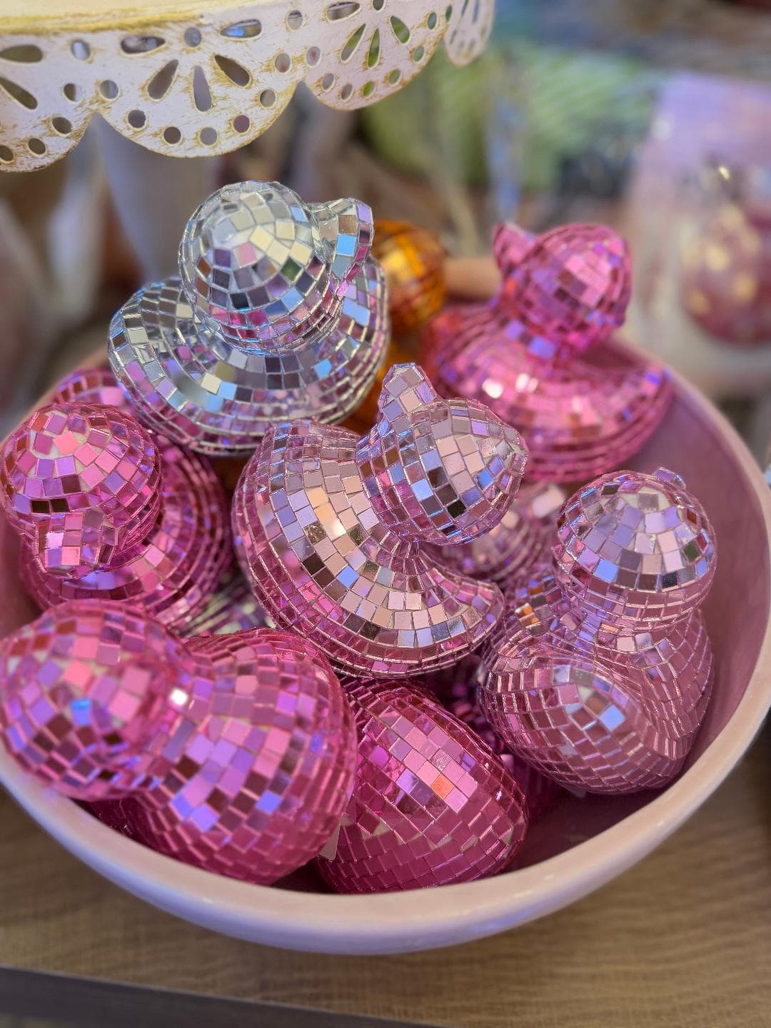 Pink and silver mirrored mushroom decorations at the bakery boutique